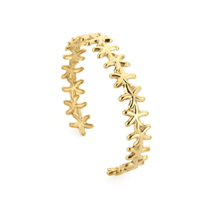Bangle armband met zeesterren in het goud