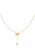 Gouden ketting met strikje en hartjes hanger