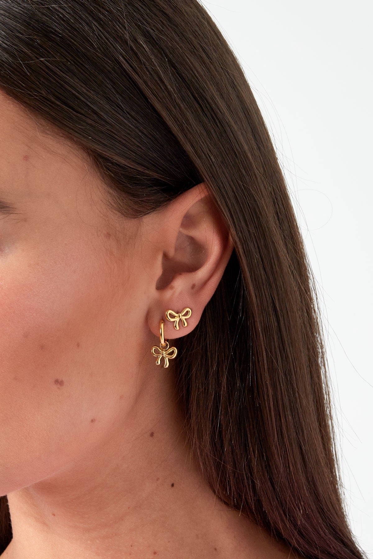 Strikjes stud oorbellen goud