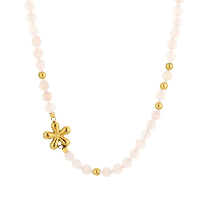 Kralenketting met beige kralen en gouden bloem