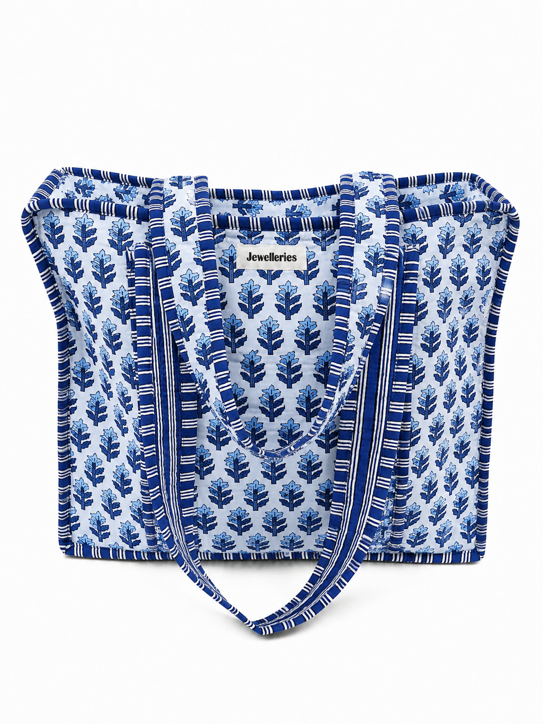 Vrolijke en kleurrijke shopper tas met bloemenprint in het blauw met wit met lang hengsel en ritssluiting. De tas voor werk, school of vakantie. 
