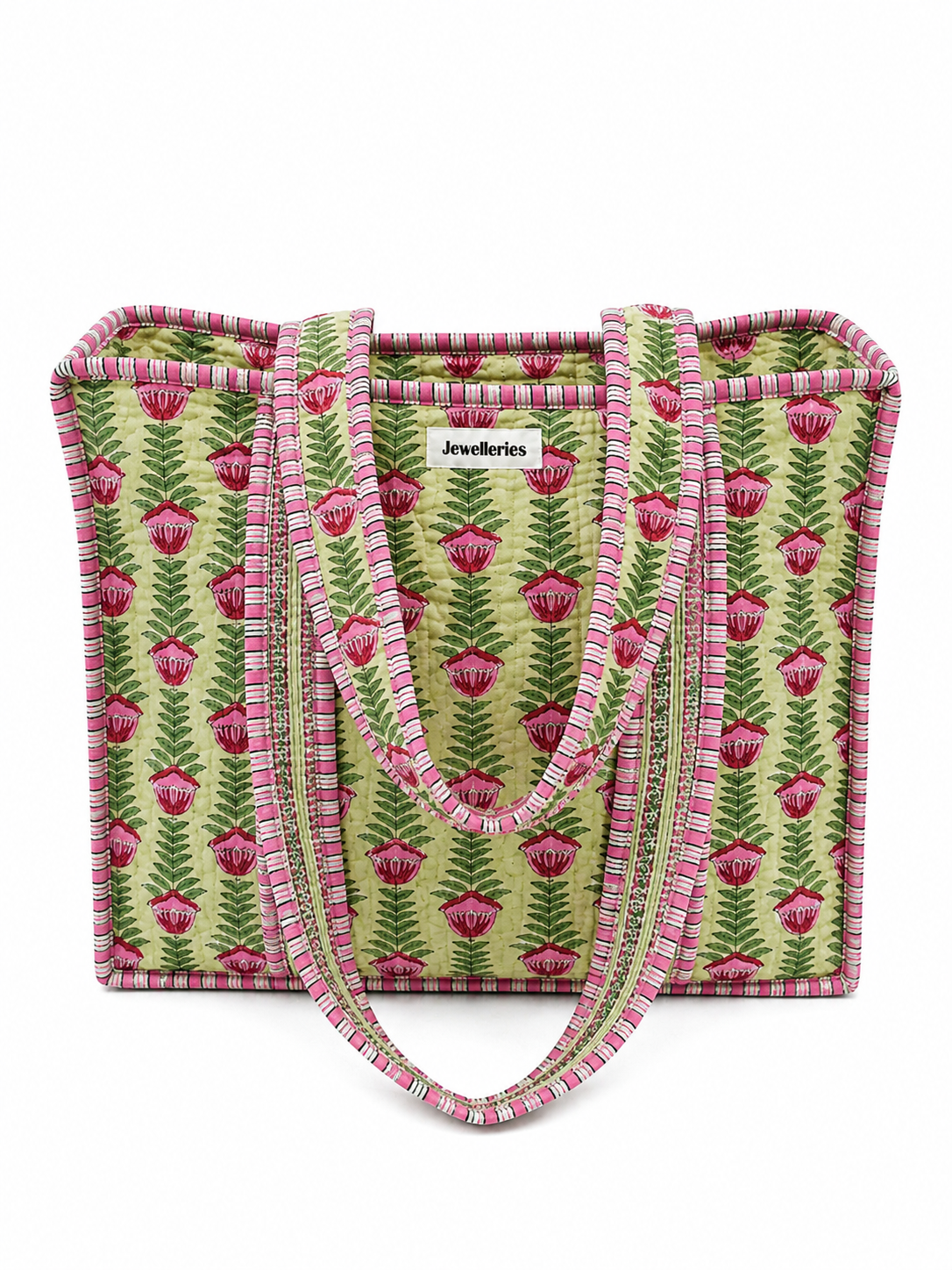 Vrolijke en kleurrijke shopper tas met bloemenprint in het wit met bloemen in het roze met groen en lang hengsel met ritssluiting. De tas voor werk, school of vakantie. 