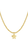 Kralen ketting met bloemen hanger in het goud