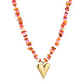 Kralen ketting met hartjes hanger oranje in het goud