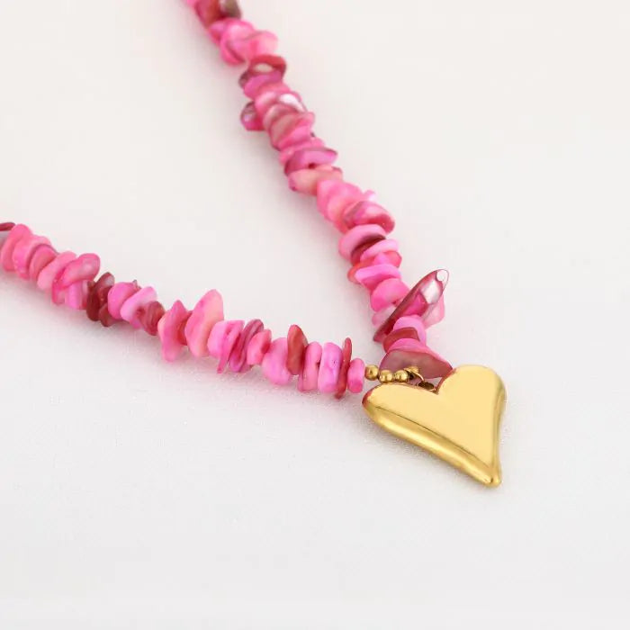 Kralen ketting met hartjes hanger roze goud