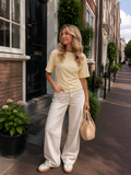 Shirt met korte mouw en getailleerd effect in het geel